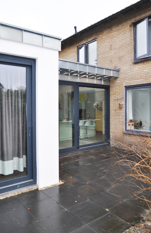 aanbouw aansluiting van de uitbouw aan de bestaande woning