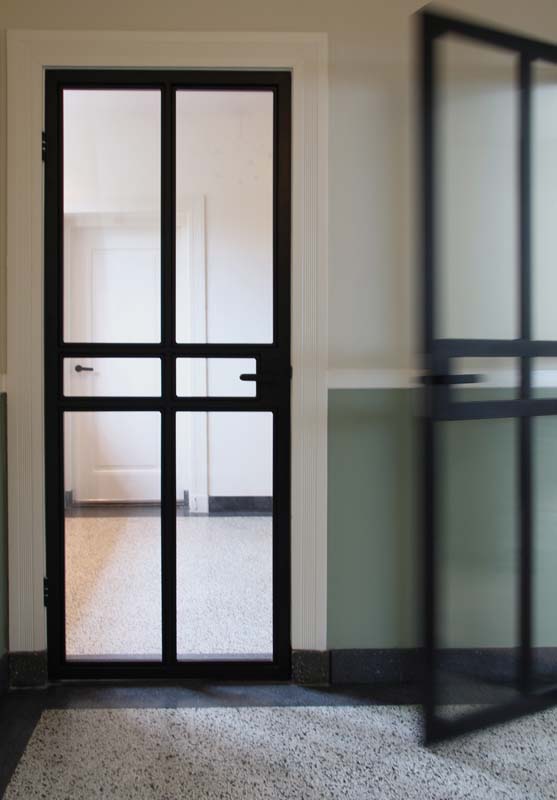 interieurarchitectuur stalen deur terrazzo vernieuwbouw